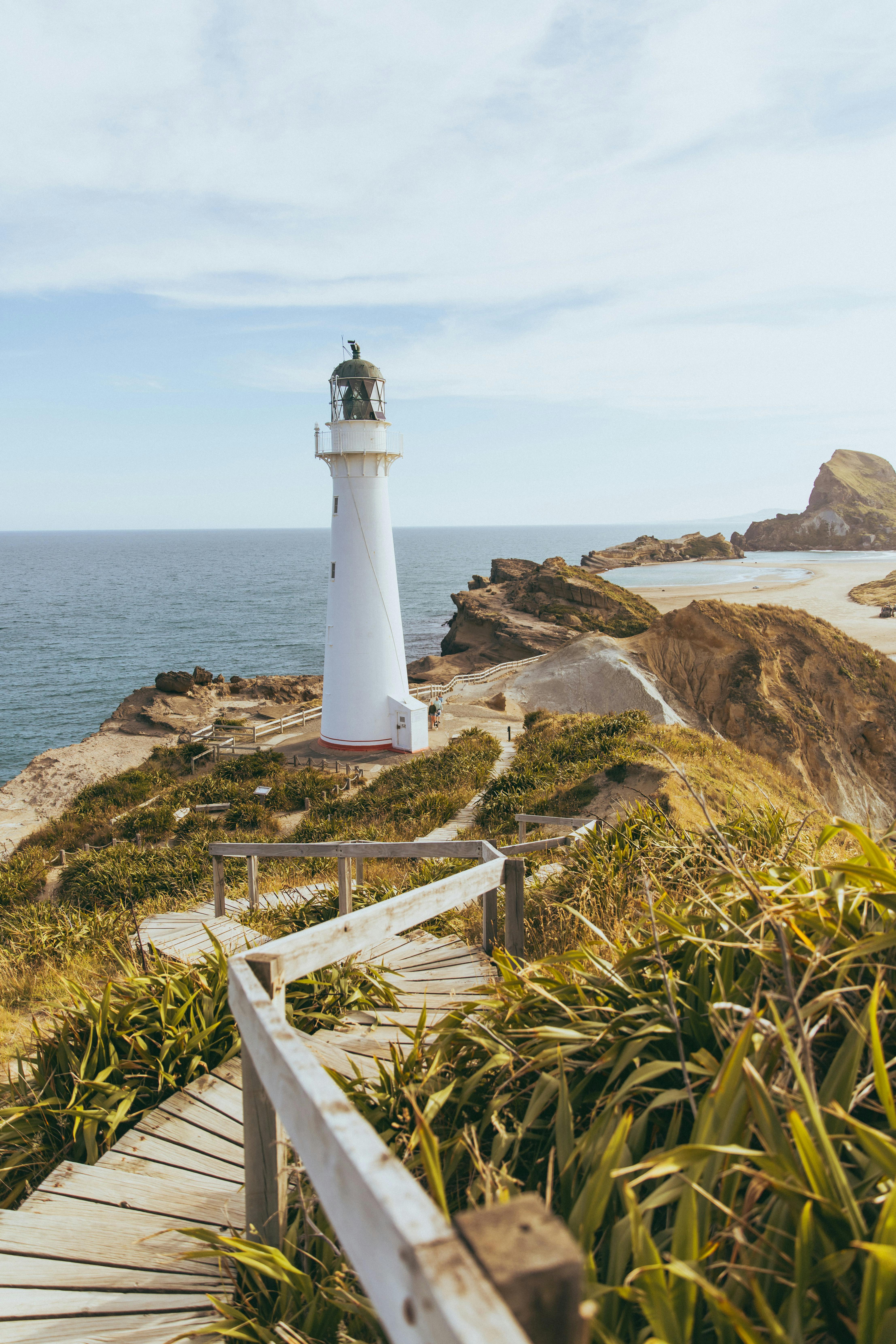 Lighthouse on coastal landscape